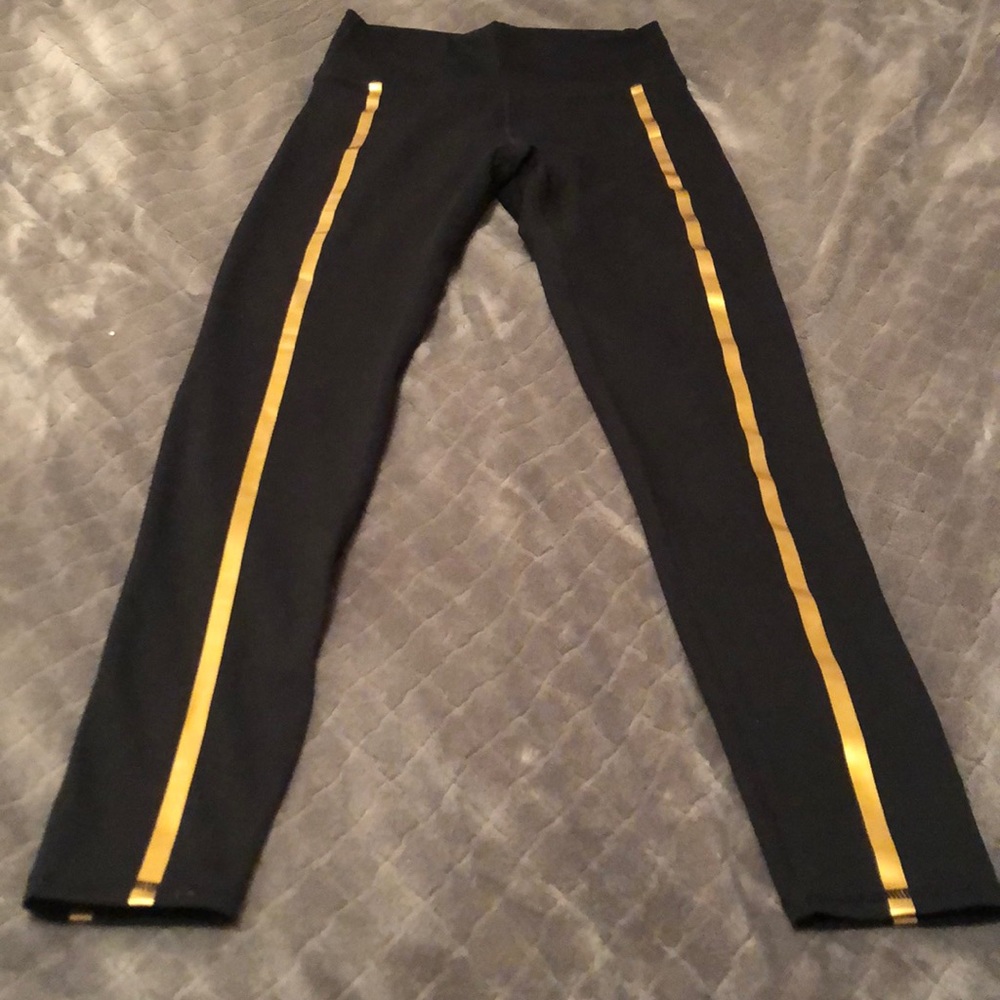 Fabletics black with gold stripe legging